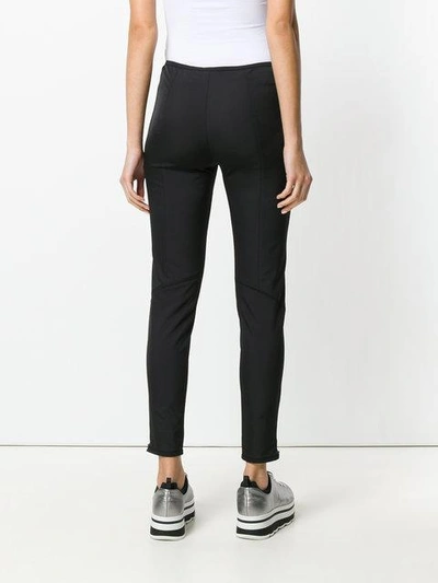 Shop Prada Paneled Skinny Fit Trousers In Black