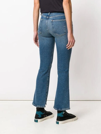 Shop Current Elliott Flared Cropped Jeans In Blue
