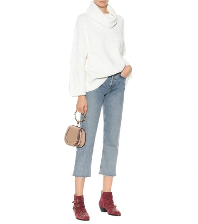 Shop Chloé Wool Turtleneck Sweater In White