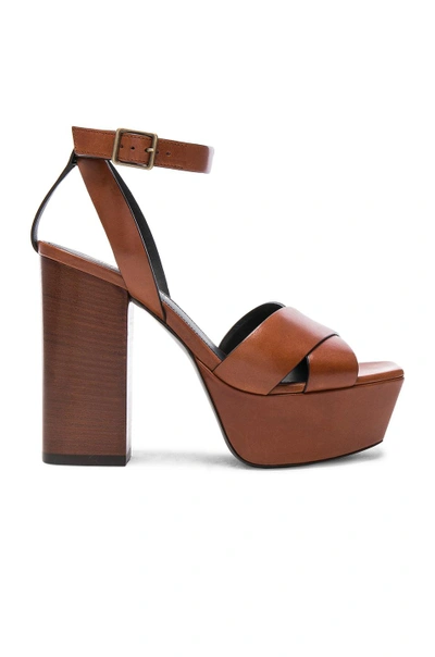 Shop Saint Laurent Leather Farrah Cross Strap Platform Sandals In Brown