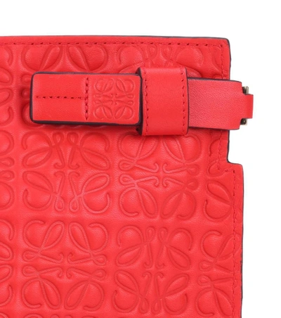 Shop Loewe T Pouch Embossed Leather Clutch In Red