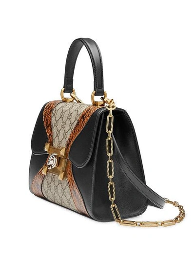 Shop Gucci Osiride Small Gg Top Handle Bag In Black