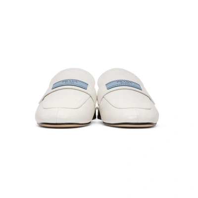 Shop Prada White  Tag Slippers In F0009 White