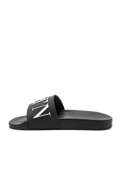 Shop Valentino Garavani Garavani Vltn Logo Slide In Black & White