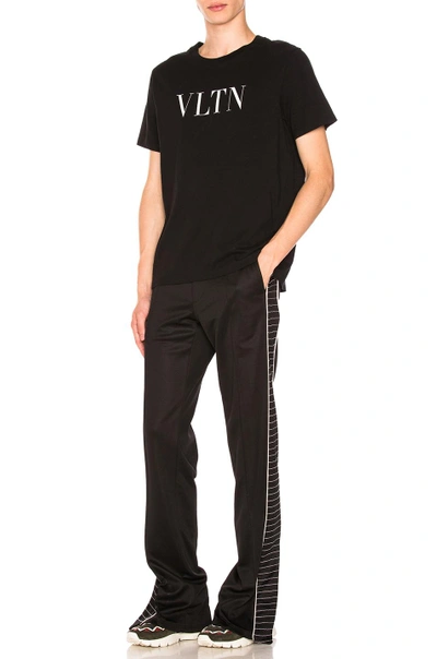 Shop Valentino Taped Side Pants In Black