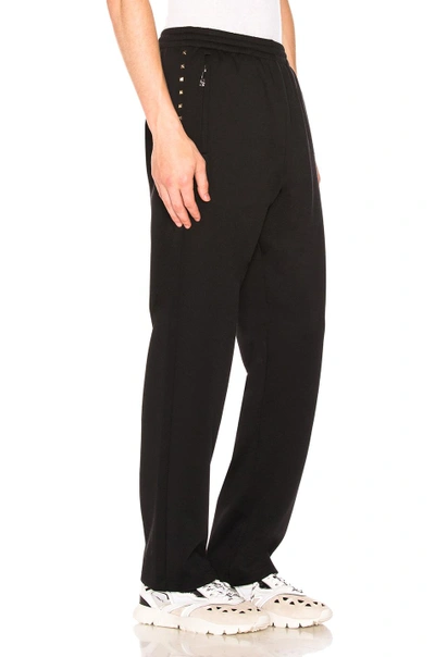 Shop Valentino Studded Track Pant In Black