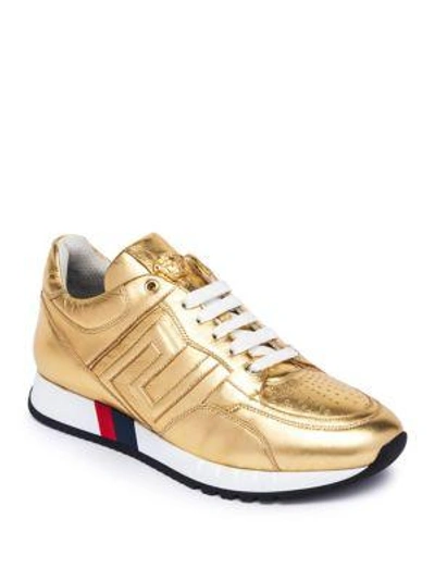 Shop Versace Grecca Metallic Low-top Sneakers In Gold