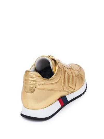 Shop Versace Grecca Metallic Low-top Sneakers In Gold