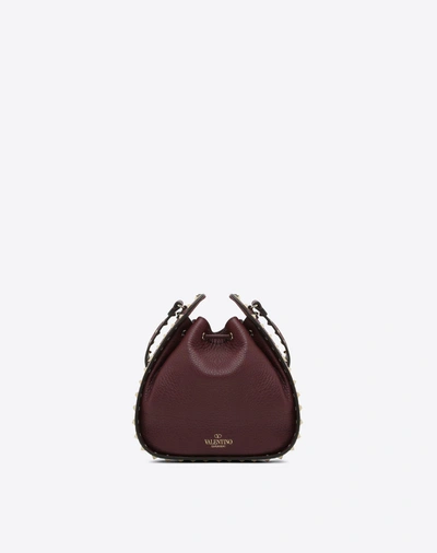 Shop Valentino Rockstud Small Bucket Bag In Dark Purple