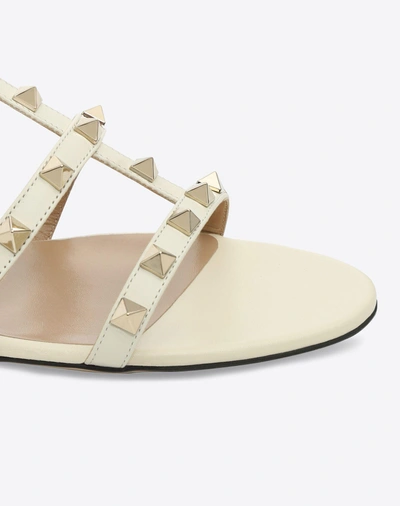 Shop Valentino Garavani Rockstud Flat Calfskin Slide Sandal In Light Ivory