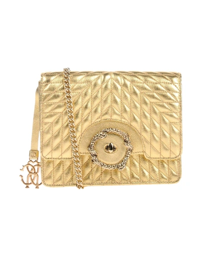 Shop Roberto Cavalli Handbag In Gold