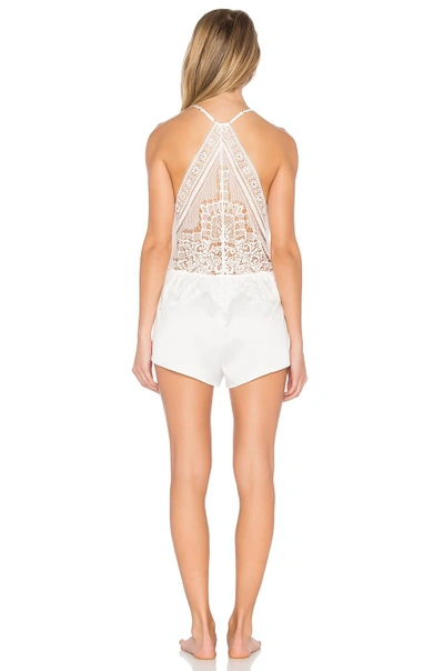 Shop Flora Nikrooz Genevive Charmeuse Lace Romper In White. In Ivory