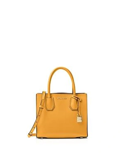 Shop Michael Michael Kors Studio Mercer Medium Leather Messenger In Marigold Yellow/gold