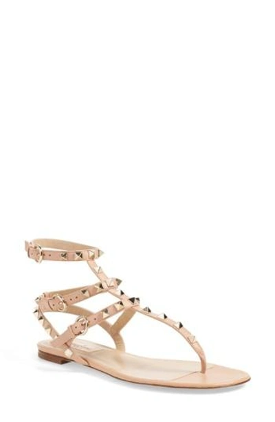 Shop Valentino Rockstud Cage Thong In Beige Leather