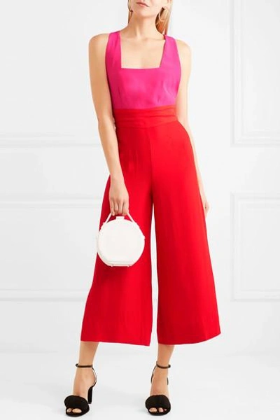 Shop Staud Joyce Cropped Two-tone Crepe De Chine Jumpsuit In Red