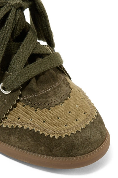 Shop Isabel Marant Bobby Perforated Canvas And Suede Wedge Sneakers In Army Green