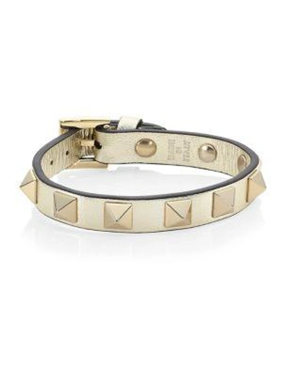 Shop Valentino Rockstud Leather Bracelet In Gold