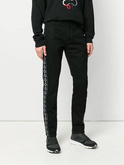 Shop Marcelo Burlon County Of Milan 'kappa' Jeans Mit Geradem Bein In 6710 Light Wash Black