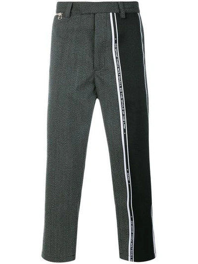 Shop Oamc Cropped Stripe Panel Trousers - Grey