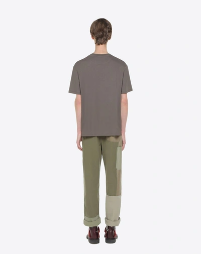 Shop Valentino T-shirt With Military Embellishments In Military Green