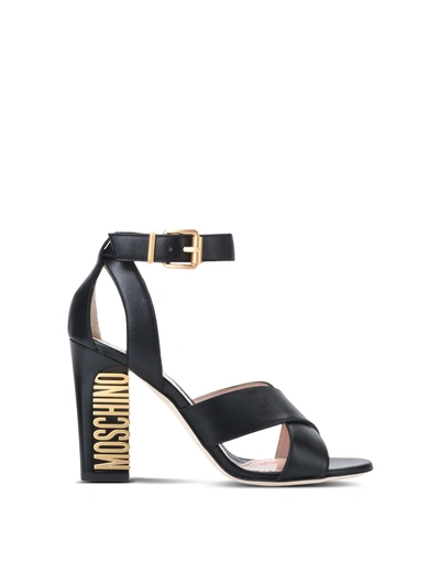 Shop Moschino Sandals In Black