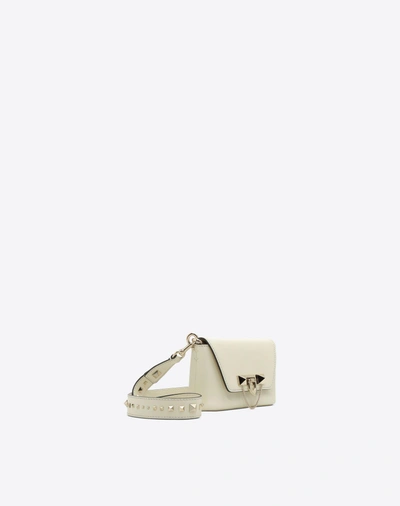 Shop Valentino Demilune Small Cross Body Bag In Ivory