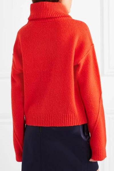 Shop Tory Burch Eva Convertible Oversized Wool-blend Turtleneck Sweater In Bright Orange