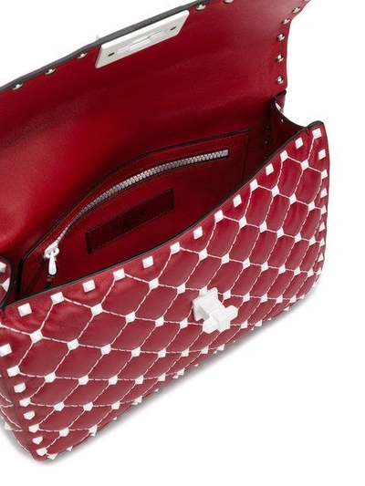 Shop Valentino Vltn  Garavani Rockstud Spike Crossbody Bag In Red