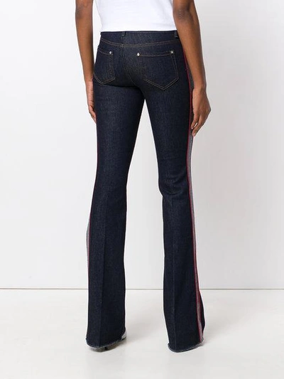 Shop Red Valentino Flared Jeans With Side Band - Blue