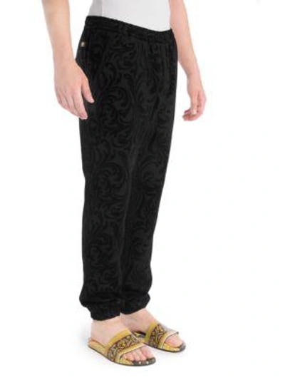 Shop Versace Cotton Track Pants In Black