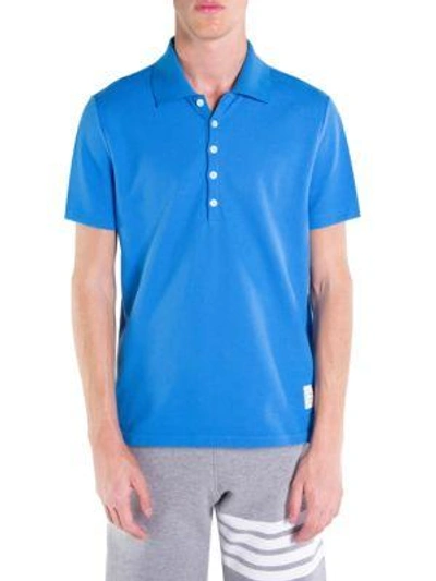 Shop Thom Browne Short-sleeve Relaxed-fit Cotton Polo In Light Blue