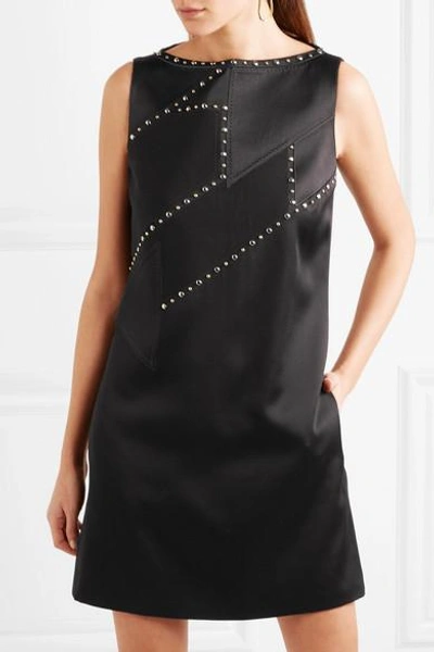 Shop Versace Studded Paneled Satin And Crepe Mini Dress In Black