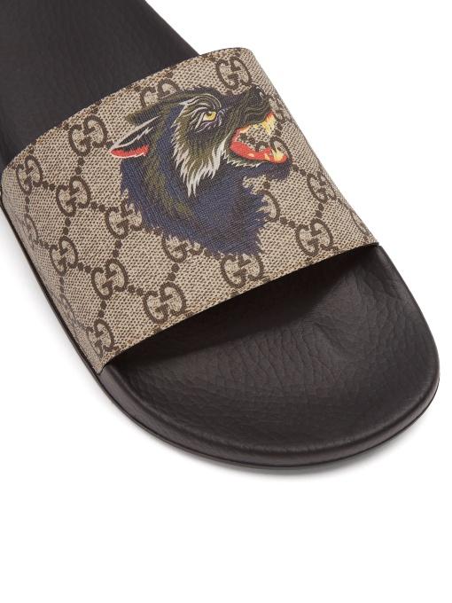 Indigenous Held og lykke Skærpe Gucci Men's Gg Supreme Wolf Head Slide Sandals In Neutrals | ModeSens