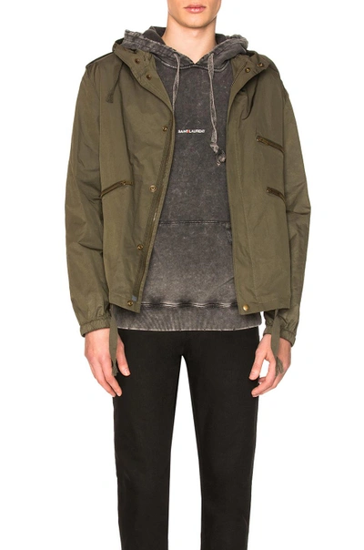 Shop Saint Laurent Hooded Military Jacket In Green