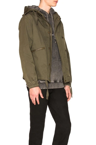 Shop Saint Laurent Hooded Military Jacket In Green