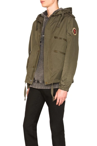 Shop Saint Laurent Hooded Military Jacket In Green