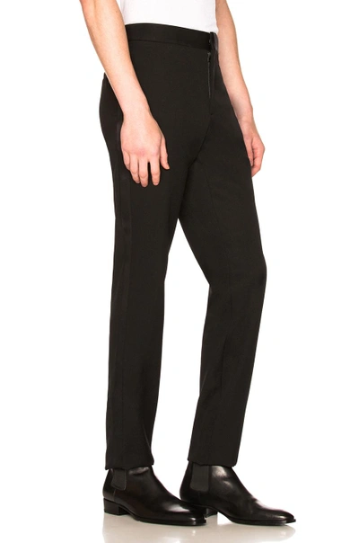 Shop Saint Laurent Flat Front Trousers In Black