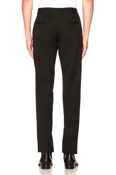 Shop Saint Laurent Flat Front Trousers In Black