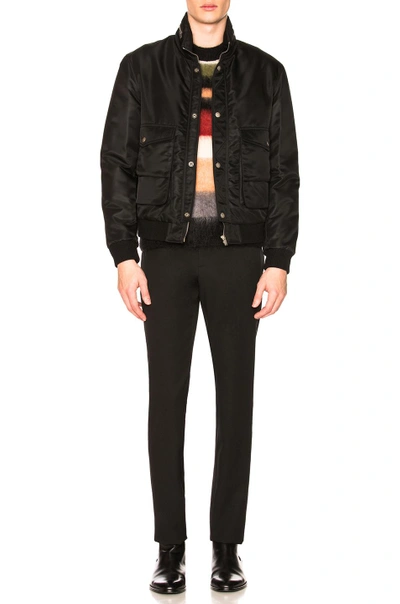 Shop Saint Laurent Flat Front Trousers In Black