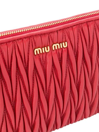 Shop Miu Miu Matelassé Wristlet Clutch In Red
