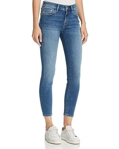 Shop Mavi Adriana Ankle Mid Rise Super Skinny Jeans In Mid Supersoft
