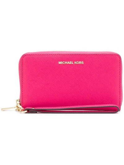 Shop Michael Michael Kors Jet Set Large Smartphone Wristlet - Pink In Pink & Purple