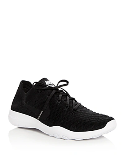 Shop Nike Women's Free Flyknit Lace Up Sneakers In Black/black