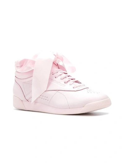 Shop Reebok Freestyle Hi Satin Bow Sneakers In Pink