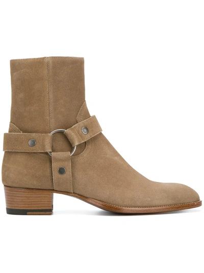 Shop Saint Laurent Classic Wyatt Harness Boots - Neutrals