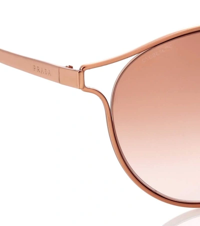 Shop Prada Round Sunglasses In Pink