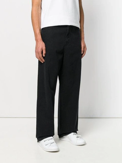 Shop Raf Simons Wide Leg Jeans In Black