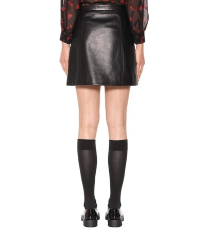 Shop Miu Miu Leather Miniskirt In Black