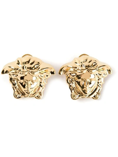 Shop Versace Medusa Head Clip On Earrings - Metallic