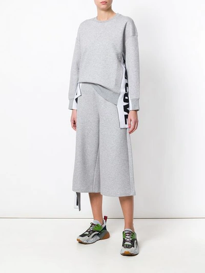 Shop Stella Mccartney Cropped Flared Trousers In Grey